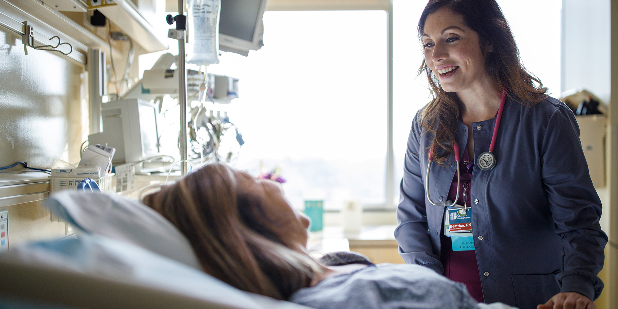 Medical professional talking to patient