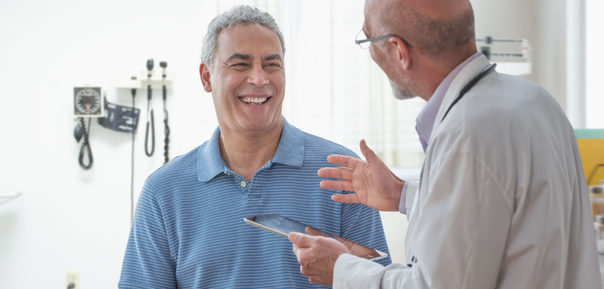Elderly Man with Doctor