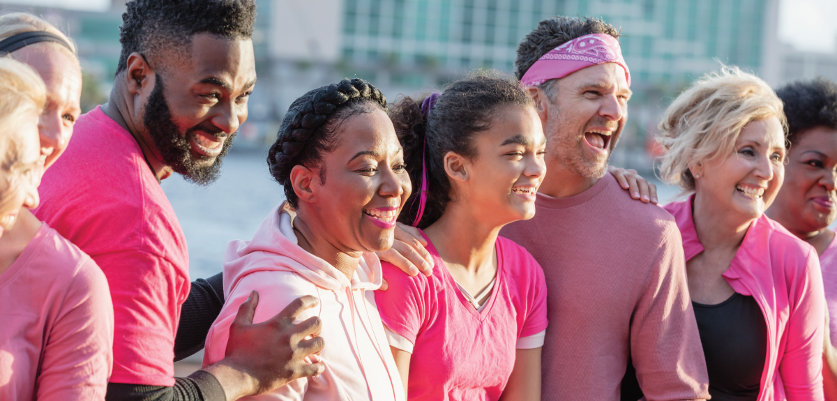 Men and women wearing pink for breast cancer awareness