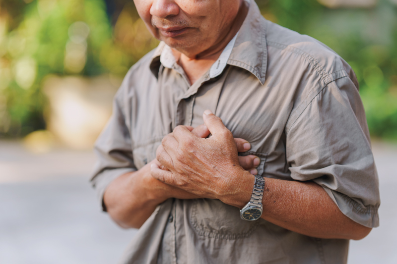 Man holding chest