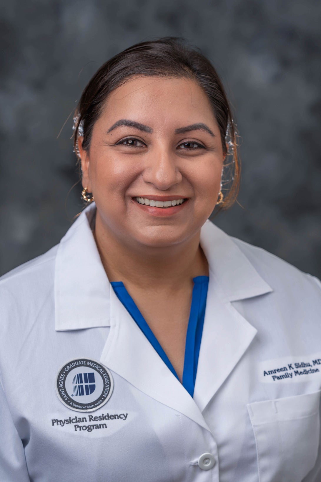 Amreen Sidhu, MD